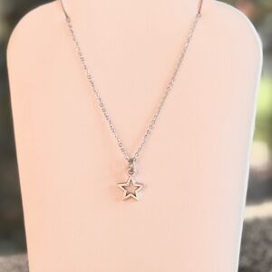 Children’s tiny star necklace.